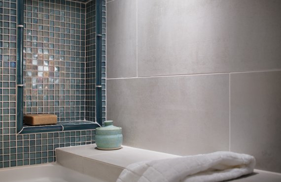 Renovated Oceanside, CA bathroom utilizing Blue series glasstile manufactured by Oceanside Glasstile.