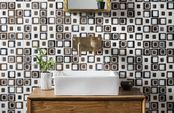 Vignette photography of Devotion glass tile line includes new patterns and new Italian glass and antique mirror.